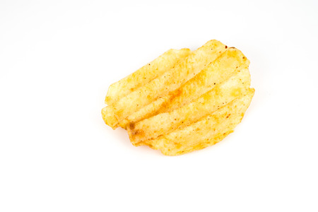 One potato chips on a white background and shadowの写真素材