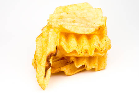 Potato chips on a white background and shadowの写真素材