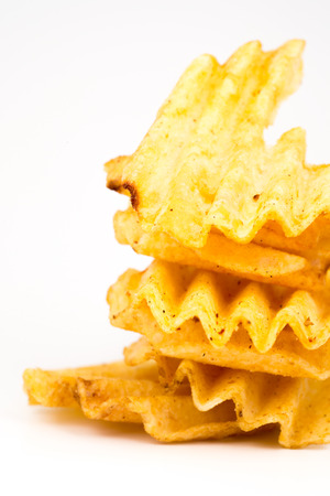 Potato chips on a white background and shadowの写真素材