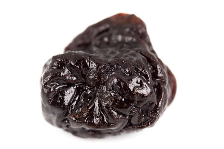Close up prune on white backgroundの写真素材