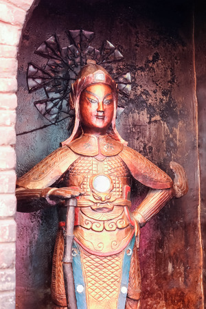 Statue in Feng Huang, the most famous ancient town in Hunan province, China.の写真素材