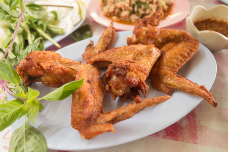 Thai style fried chicken wingsの写真素材