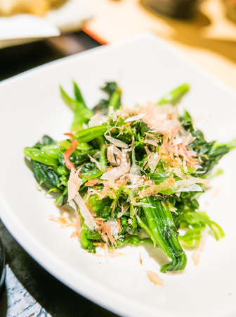 Japanese Salad - Fresh Fruit , Vegetables and dressing on white plateの写真素材