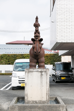 Kawaguchiko, Japan -December 3, 2015: Animal statue in front of apartment near Kawaguchiko station, Yamanashi, Japan. Lake Kawaguchiko is part of Fuji Five Lakes in Fuji-Hakone-Izu National Parkのeditorial素材