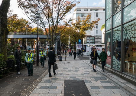 TOKYO JAPAN - NOVEMBER 30, 2015:  People walking in Harajuku. Harajuku is known as a center of Japanese youth culture and fashion and shopping.のeditorial素材