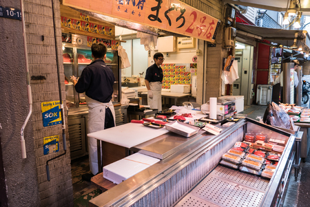 Tokyo, Japan - November 30, 2015: A small area of Tsukiji fish market, The Tsukiji Market, supervised by the Tokyo Metropolitan Central Wholesale Market of the Tokyo Metropolitan Bureau of Industrial and Labor Affairs, is the biggest wholesale fish and seのeditorial素材