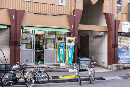 Tokyo, Japan - November 30, 2015: A small area of Tsukiji fish market, The Tsukiji Market, supervised by the Tokyo Metropolitan Central Wholesale Market of the Tokyo Metropolitan Bureau of Industrial and Labor Affairs, is the biggest wholesale fish and seのeditorial素材