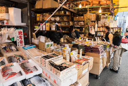 Tokyo, Japan - November 30, 2015: A small area of Tsukiji fish market, The Tsukiji Market, supervised by the Tokyo Metropolitan Central Wholesale Market of the Tokyo Metropolitan Bureau of Industrial and Labor Affairs, is the biggest wholesale fish and seのeditorial素材