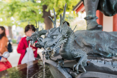 Tokyo, Japan-Nov 30, 2015. Fountain Statue in Sensoji Temple, Asakusa, Tokyo, which was taken in the morning. Sensoji Temple is one of the most popular places in Tokyo, where many tourists visit/ Sensoji Temple is one of the most popular and colorful tempのeditorial素材