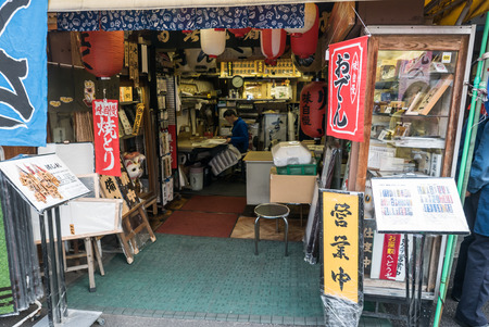 Tokyo, Japan - November 30, 2015: A small area of Tsukiji fish market, The Tsukiji Market, supervised by the Tokyo Metropolitan Central Wholesale Market of the Tokyo Metropolitan Bureau of Industrial and Labor Affairs, is the biggest wholesale fish and seのeditorial素材