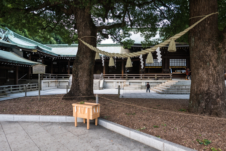 Tokyo, Japan - November 30, 2015: Several tourists visiting the centre of a famous shrine in Tokyo, Japan.のeditorial素材