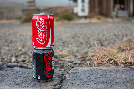 KUMAMOTO, JAPAN - SEPTEMBER 27, 2014: Coca-Cola cans. Coca-cola is the world's most selling carbonated soft drinkのeditorial素材