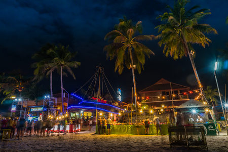 Koh Phangan, Thailand - October 8, 2014: The Full moon party at Haad Rin, Koh Phangan, Thailand. The Full Moon Party is an all-night beach party that originated in Haad Rin on the island of Ko Pha Ngan, Thailand on the night of, before or after every fullのeditorial素材