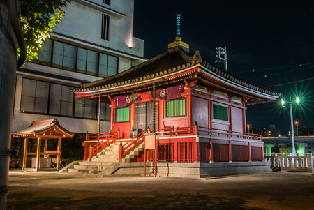 Tokyo, Japan - April 30, 2016: Small shrine near Senso-ji temple at night in Asakusa, Tokyo. Asakusa is a famous tourism district with famous temple Sensoji and Tokyo Sky Treeのeditorial素材