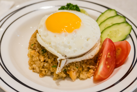 Japanese style Fried rice tuna with topped egg.の写真素材