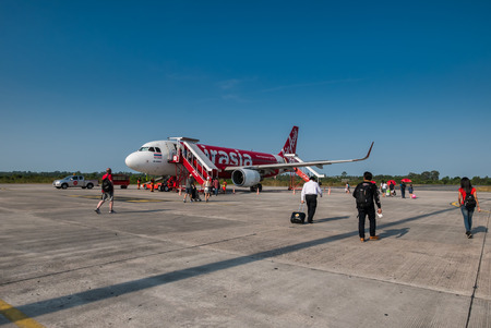Nakhon Si Thammarat, Thailand - April 27, 2016: AirAsia airplane in Nakhon Si Thammarat airport in Nakhon Si Thammarat province, Thailand. Its been named as world's best low-cost airline, operates scheduled flights to 78 destinationsのeditorial素材