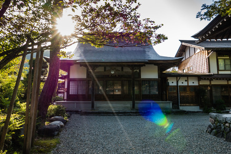 Shirakawa-go, Japan - May 2, 2016: Building with sun flare in Shirakawa-go. Shirakawa-go is one of Japan's UNESCO World Heritage Sites located in Gifu Prefecture, Japan.のeditorial素材