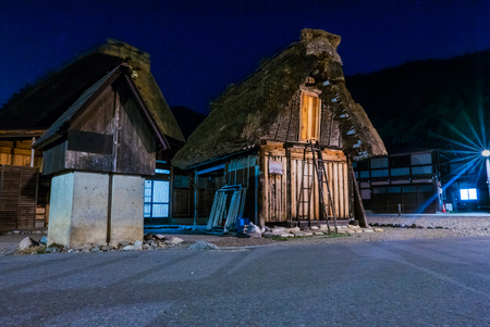 Shirakawa-go, Japan - May 2, 2016: Several traditional gassho-zukuri houses in Shirakawa-go at night. Shirakawa-go is one of Japan's UNESCO World Heritage Sites located in Gifu Prefecture, Japan.のeditorial素材