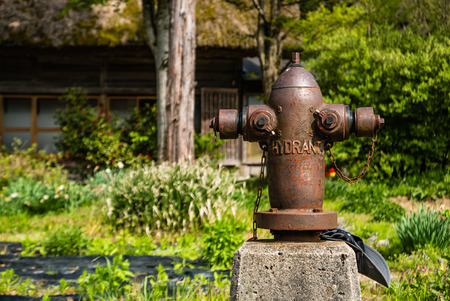 Old fire hydrant in Shirakawa-goの写真素材