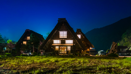 Shirakawa-go, Japan - May 2, 2016: Several traditional gassho-zukuri houses in Shirakawa-go at night. Shirakawa-go is one of Japan's UNESCO World Heritage Sites located in Gifu Prefecture, Japan.のeditorial素材