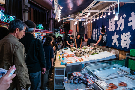 Kanazawa, Japan - May 3, 2016 : People at Ohmicho Ichiba Fish Market in Kanazawa, Japan. It is the biggest fish market in Kanazawa. It selling all manner of freshly caught seafood.のeditorial素材