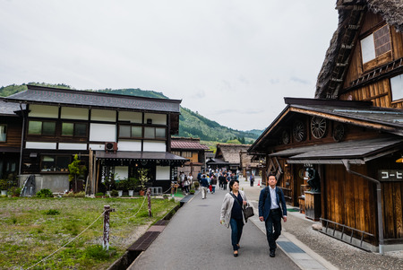 Shirakawa-go, Japan - May 3, 2016: Tourists visiting Shirakawa-go. Shirakawa-go is one of Japan's UNESCO World Heritage Sites located in Gifu Prefecture, Japan.のeditorial素材