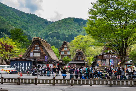 Shirakawa-go, Japan - May 3, 2016: Tourists visiting Shirakawa-go. Shirakawa-go is one of Japan's UNESCO World Heritage Sites located in Gifu Prefecture, Japan.のeditorial素材
