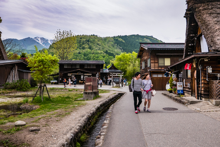 Shirakawa-go, Japan - May 3, 2016: Tourists visiting Shirakawa-go. Shirakawa-go is one of Japan's UNESCO World Heritage Sites located in Gifu Prefecture, Japan.のeditorial素材