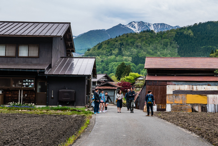 Shirakawa-go, Japan - May 3, 2016: Tourists visiting Shirakawa-go. Shirakawa-go is one of Japan's UNESCO World Heritage Sites located in Gifu Prefecture, Japan.のeditorial素材