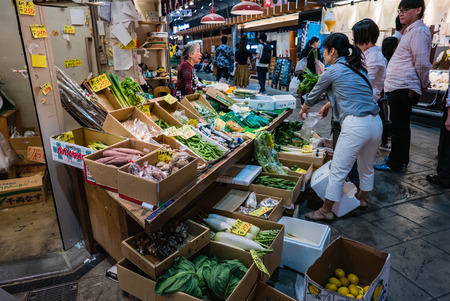 Kanazawa, Japan - May 3, 2016 : Vendor in Ohmicho Ichiba Fish Market in Kanazawa, Japan. It is the biggest fish market in Kanazawa. It selling all manner of freshly caught seafood.のeditorial素材