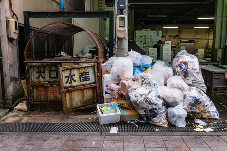 Kanazawa, Japan - May 3, 2016: Garbage bags at Ohmicho Ichiba Fish Market in Kanazawa, Japan. It is the biggest fish market in Kanazawa. It selling all manner of freshly caught seafood.のeditorial素材