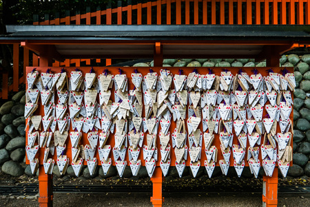 Kyoto, Japan - May 4, 2016: Fox Shape Ema (small wooden wishing plaques) at Fushimi Inari shrine. Fushimi Inari Taisha is the head shrine of Inari, located in Fushimi-ku, Kyoto, Japan.のeditorial素材