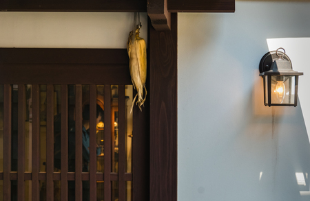 Kanazawa, Japan - Corn hanging on the old house at Higashi Chaya District (East Geisha District) in Kanazawa, Ishikawa Prefecture, Japan, known for tea houses where geishas perform since the 17th century.のeditorial素材
