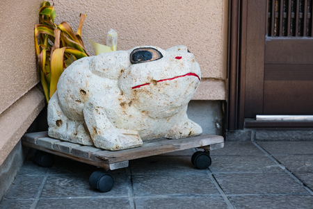 Old plaster statue of frog in Higashi Chaya District, Kanazawa, Ishikawa Prefecture, Japanのeditorial素材