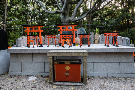 Kyoto, Japan - May 4, 2016: Ema prayer tables with unique Torii gates boards at Fushimi Inari shrine. Fushimi Inari Taisha is the head shrine of Inari, located in Fushimi-ku, Kyoto, Japan.のeditorial素材