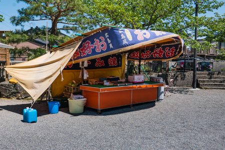 Kanazawa, Japan - May 4, 2016: Vendor at Utasu Jinja Shrine near Higashi Chaya District (East Geisha District) in Kanazawa, Ishikawa Prefecture, Japan. This shrine is on the way from the Higashi Chaya District to the temple area on Utatsuyama Hill.のeditorial素材