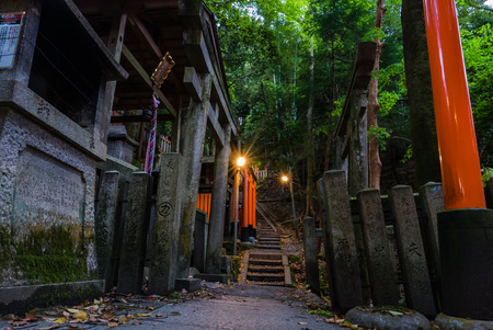 Kyoto, Japan - May 4, 2016: Trails up the mountain at Fushimi Inari shrine. Fushimi Inari Taisha is the head shrine of Inari, located in Fushimi-ku, Kyoto, Japan.のeditorial素材