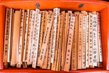Kyoto, Japan - May 4, 2016: Prayer wooden stripes at Fushimi Inari Shrine. Fushimi Inari Taisha is the head shrine of Inari, located in Fushimi-ku, Kyoto, Japan.のeditorial素材