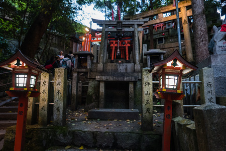 Kyoto, Japan - May 4, 2016: Small shrine in Fushimi Inari shrine. Fushimi Inari Taisha is the head shrine of Inari, located in Fushimi-ku, Kyoto, Japan.のeditorial素材
