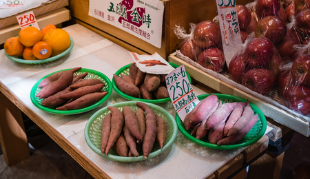 Kanazawa, Japan - May 4, 2016 : Fruit and vegetable shop in Ohmicho Ichiba Fish Market in Kanazawa, Japan. It is the biggest fish market in Kanazawa. It selling all manner of freshly caught seafood.のeditorial素材