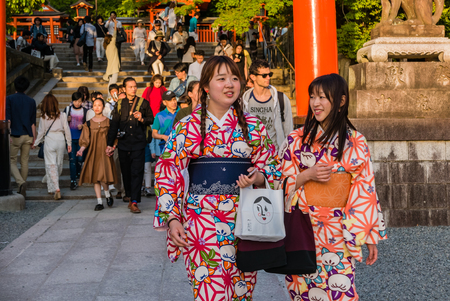 Kyoto, Japan - May 4, 2016: Tourists visiting Fushimi Inari shrine. Fushimi Inari Taisha is the head shrine of Inari, located in Fushimi-ku, Kyoto, Japan.のeditorial素材