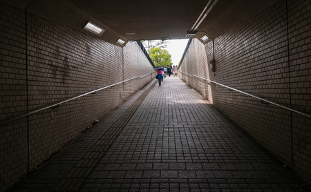 Hiroshima, Japan - May 5, 2016: People walking in Cross Street Tunnel in Hiroshima Prefecture, Chugoku region, Japan.のeditorial素材
