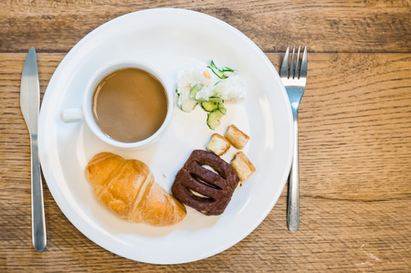Flat lay breakfast on white plate.の写真素材
