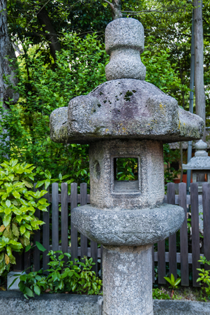 Kyoto, Japan - May 7, 2016: Stone lantern at Yasaka-jinja Shrine in Kyoto. Yasaka-jinja Shrine is a famous shrine in the Ancient city of Kyoto, Japan.のeditorial素材