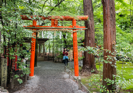 Kyoto, Japan - May 7, 2016: Tourist at Nonomiya Shrine, Arashiyama distric, in Kyoto, Japan. Nonomiya shrine is surrounded with a bamboo grove, and it is well known that the Kuroki No Torii (black torii gate).のeditorial素材