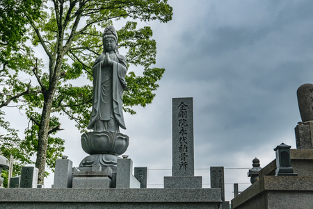 Kyoto, Japan - May 7, 2016: Japanese cemetery at Bamboo forest of Arashiyama, Kyoto, Japan. Arashiyama is a district on the western outskirts of Kyotoのeditorial素材