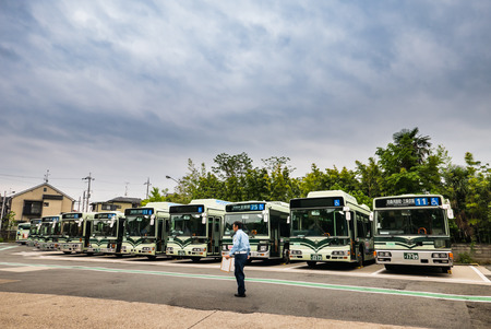 Kyoto, Japan - May 7, 2016: Kyoto city buses at bus station. Kyoto is a city located in the central part of the island of Honshu, Japanのeditorial素材
