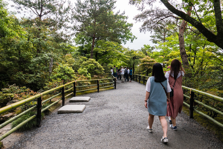 Kyoto, Japan - May 7, 2016: Tourist visiting Kinkaku-ji Temple (The Golden Pavilion) in Kyoto, Japan.のeditorial素材