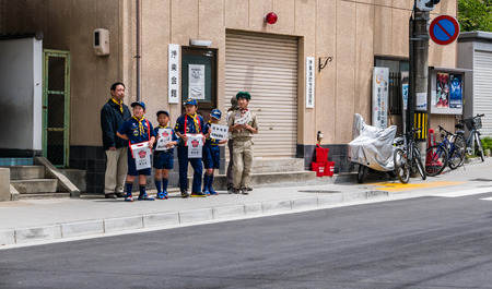 Kyoto, Japan - May 8, 2016: boy scouts at shopping street to visit Kiyomizu-dera temple in Kyoto city, Japanvisiting Kiyomizu-dera Temple in Kyoto, Japan in the morning.のeditorial素材