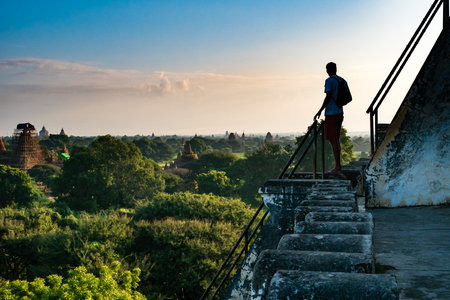 Bagan , Myanmar - October 21, 2016: Tourists enjoying the view of Bagan from the top of Shwesandaw Pagoda in morning in Bagan, Myanmarのeditorial素材